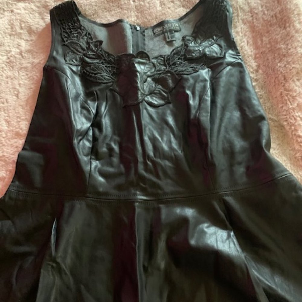 Black faux leather peplum top
